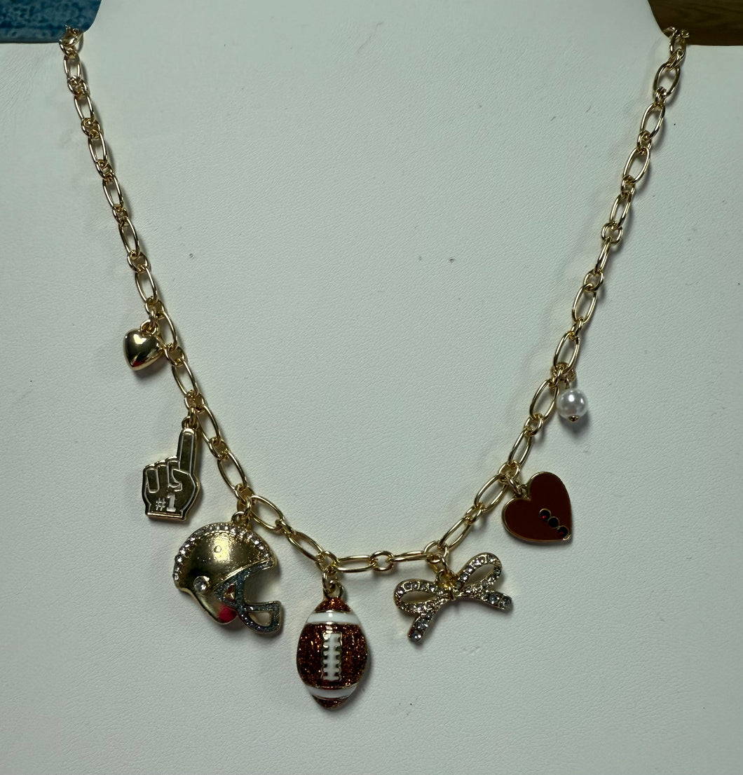 Gold touchdown helmet with glitter football charm necklace