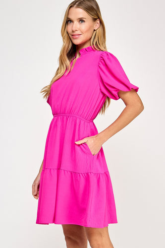 Solid tiered dress
Ruffled neckline
V neck placket
Puff short bubble sleeve
Pockets