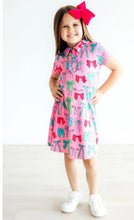 Pink twirl and bows polo dress
