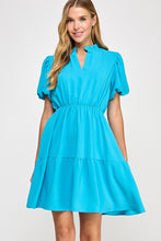 Solid tiered dress
Ruffled neckline
V neck placket
Puff short bubble sleeve
Pockets