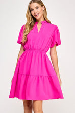 Solid tiered dress
Ruffled neckline
V neck placket
Puff short bubble sleeve
Pockets