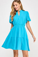 Solid tiered dress
Ruffled neckline
V neck placket
Puff short bubble sleeve
Pockets