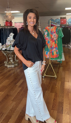 White pants- studded