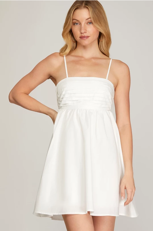 White PLEATED CUT OUT BACK WOVEN DRESS WITH BACK TIE DETAIL