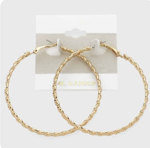 Gold metal hoop earrings