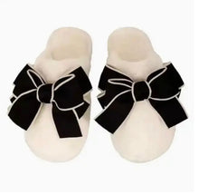Cozy cream black bow slippers