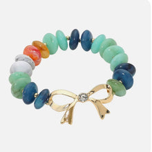 Stone Accent Metal Bow Accent Flat Resin Disc Beaded Stretch Bracelet
