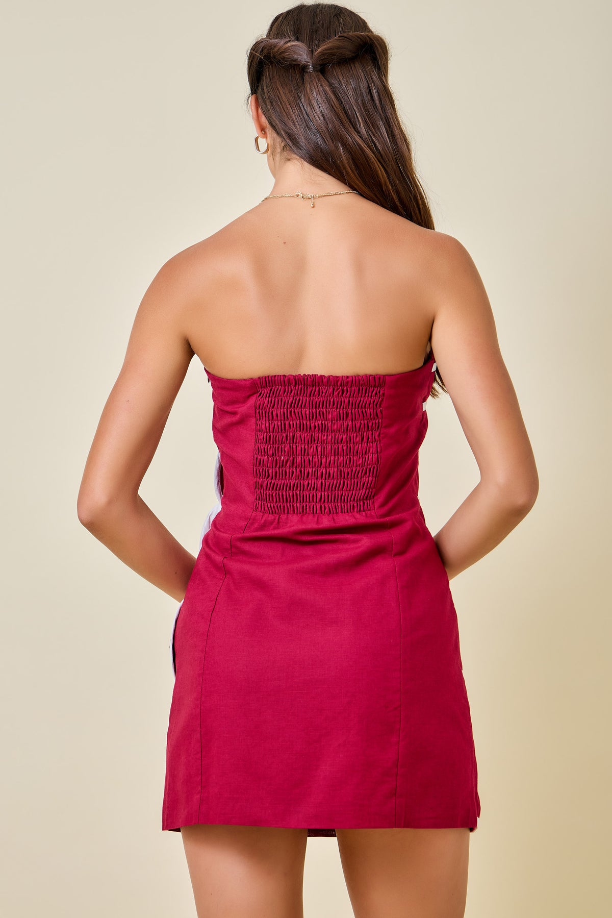 Crimson and white strapless dress scallop panels
