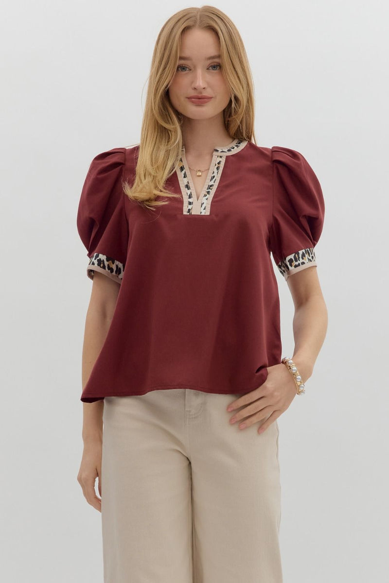 Solid pleated short voluminous sleeve pullover top featuring