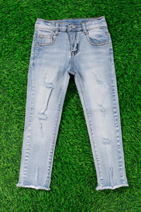 Girls-Light Blue Skinny Jeans W/Distressed Hem.
