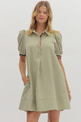 Olive Stripe pattern short puff sleeve swing shirt dress with accented multicolor rib band. Collar button closure. Lined. Woven. Non-sheer. Lightweight.