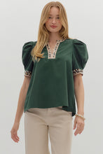Hunter green Solid pleated short voluminous sleeve pullover top featuring accent V-neck band. Unlined. Woven. Semi-sheer. LIghtweight.