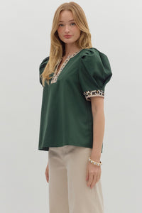 Hunter green Solid pleated short voluminous sleeve pullover top featuring accent V-neck band. Unlined. Woven. Semi-sheer. LIghtweight.
