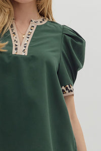 Hunter green Solid pleated short voluminous sleeve pullover top featuring accent V-neck band. Unlined. Woven. Semi-sheer. LIghtweight.