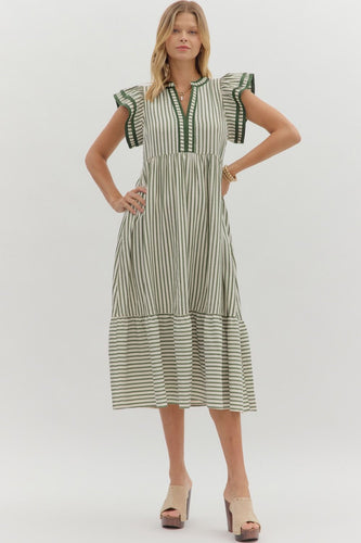 Green Textured stripe pattern tiered ruffle flutter sleeve featuring contrast accent binding detail. Side pockets. Lined. Woven. Non-sheer. Lightweight.