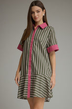 Green pink Stripe short sleeve dress with contrast trim detail and hidden buttons at front. Side pockets. Ruffle hem. Lined. Woven. Non-sheer. Lightweight.