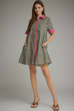 Green pink Stripe short sleeve dress with contrast trim detail and hidden buttons at front. Side pockets. Ruffle hem. Lined. Woven. Non-sheer. Lightweight.
