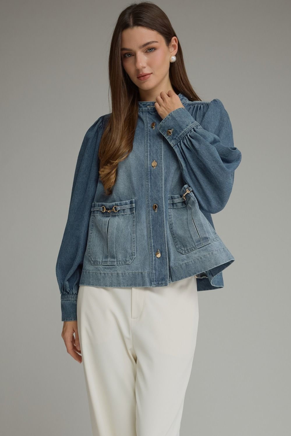 Denim jacket! Solid long puff sleeve  with button closure at front. Front patch pockets with metal hardware detail. Button cuffs. Medium weight. Jacket