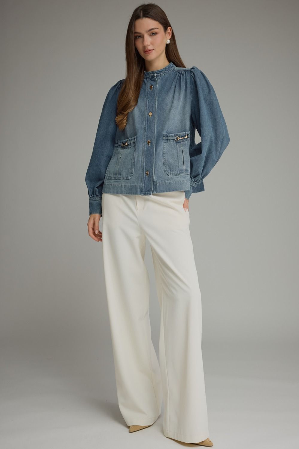 Denim jacket! Solid long puff sleeve  with button closure at front. Front patch pockets with metal hardware detail. Button cuffs. Medium weight. Jacket