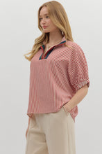 Stripe pattern high neck elasticated sleeve band dolman top featuring accented multicolor rib band split neck. Unlined. Woven. Non-sheer. Lightweight.