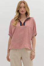 Stripe pattern high neck elasticated sleeve band dolman top featuring accented multicolor rib band split neck. Unlined. Woven. Non-sheer. Lightweight.