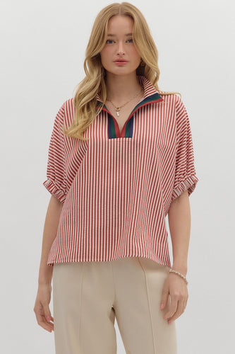 Stripe pattern high neck elasticated sleeve band dolman top featuring accented multicolor rib band split neck. Unlined. Woven. Non-sheer. Lightweight.