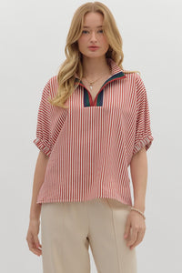 Stripe pattern high neck elasticated sleeve band dolman top featuring accented multicolor rib band split neck. Unlined. Woven. Non-sheer. Lightweight.