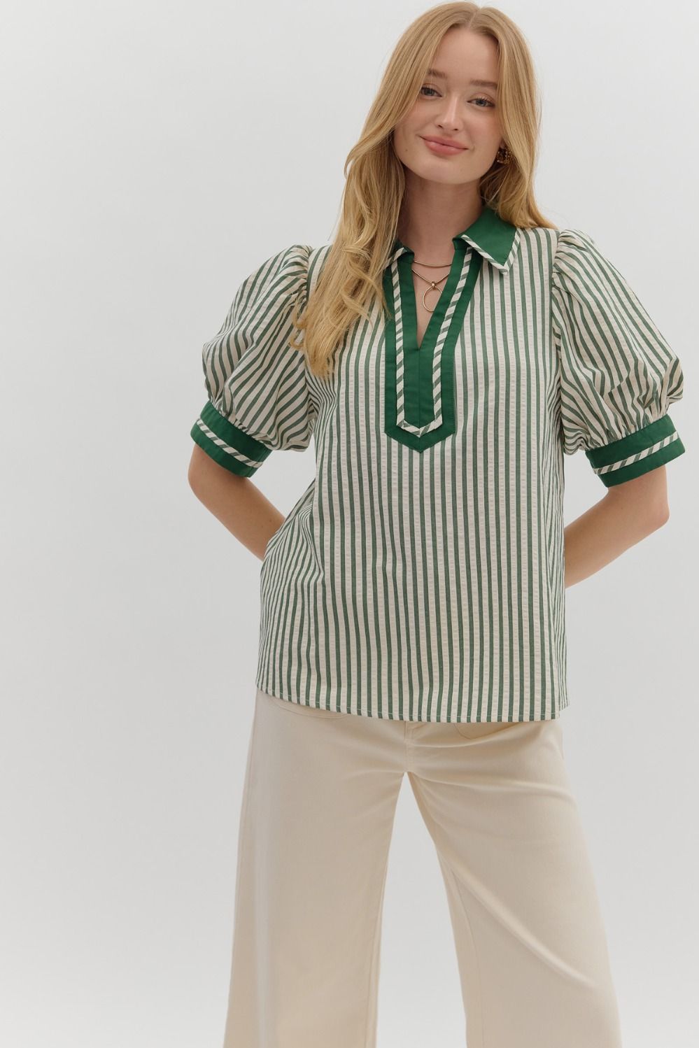 Green Stripe pattern contrast cuff band puff sleeve featuring contrast split collar pullover top. Unlined. Woven. Non-sheer. Lightweight.