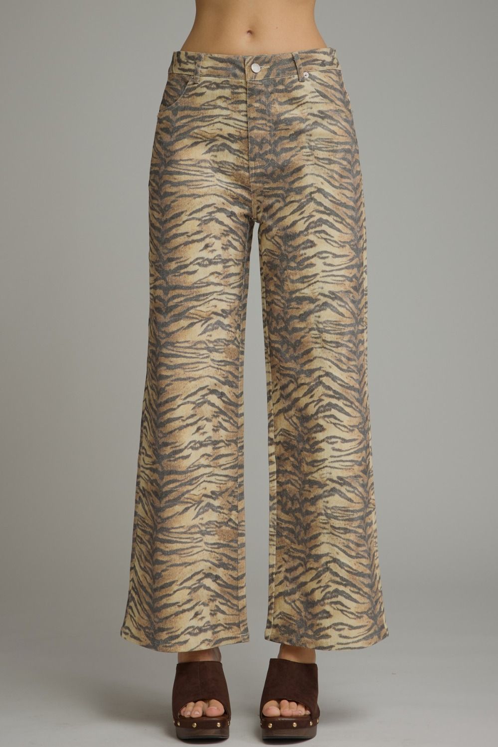 Animal print wide leg pants with front pockets and back pockets.