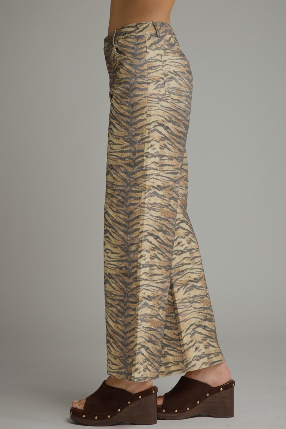 Animal print wide leg pants with front pockets and back pockets.