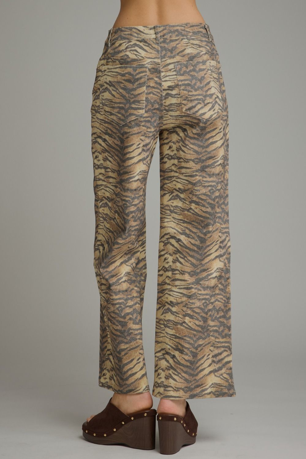 Animal print wide leg pants with front pockets and back pockets.