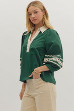 Hunter green Solid 3/4 puff sleeve top featuring contrast collar and scallop trim V-neck with rickrack trim on sleeve panels. Unlined. Woven. Non-sheer. Lightweight.