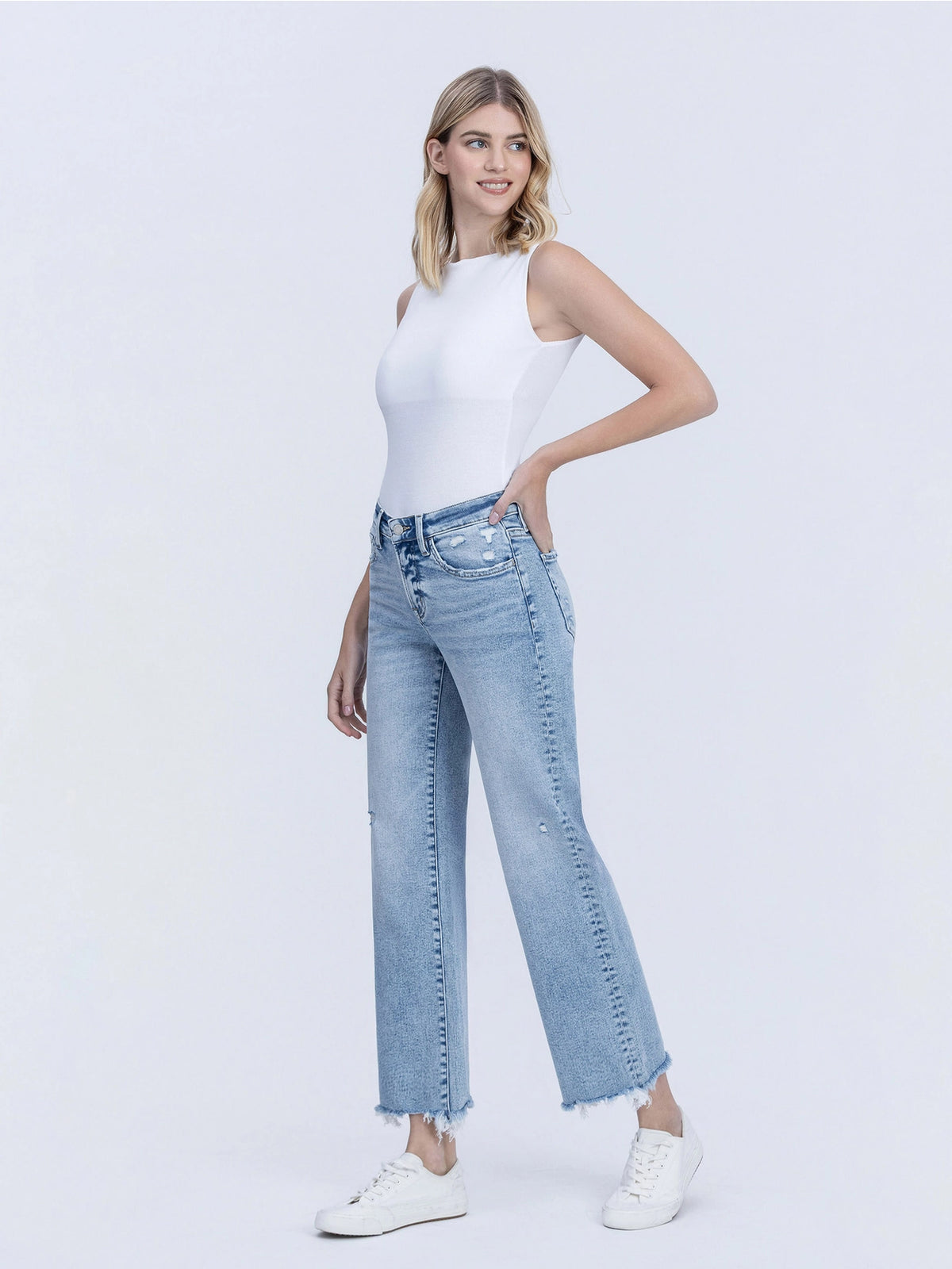 Mid Rise Uneven Raw Hem Slim Wide Jeans