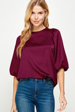 Plum -Solid satin blouse
Dramatic 3/4 puff sleeve
Elastic in wrists
Back button keyhole closure
Satin air flow fabric w/ sheen
No stretch