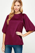Plum -Solid satin blouse
Dramatic 3/4 puff sleeve
Elastic in wrists
Back button keyhole closure
Satin air flow fabric w/ sheen
No stretch
