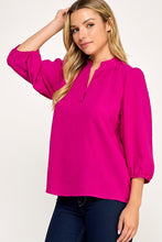 Magenta Solid blouse
Mandarin collar
V neck placket
Shirring along neckline
Shirring along shoulder