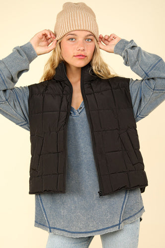 Black puffer vest